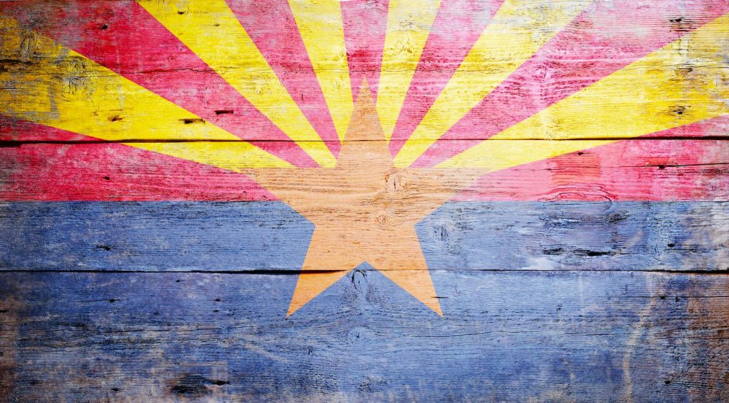 Arizona state flag washed out on reclaimed wood