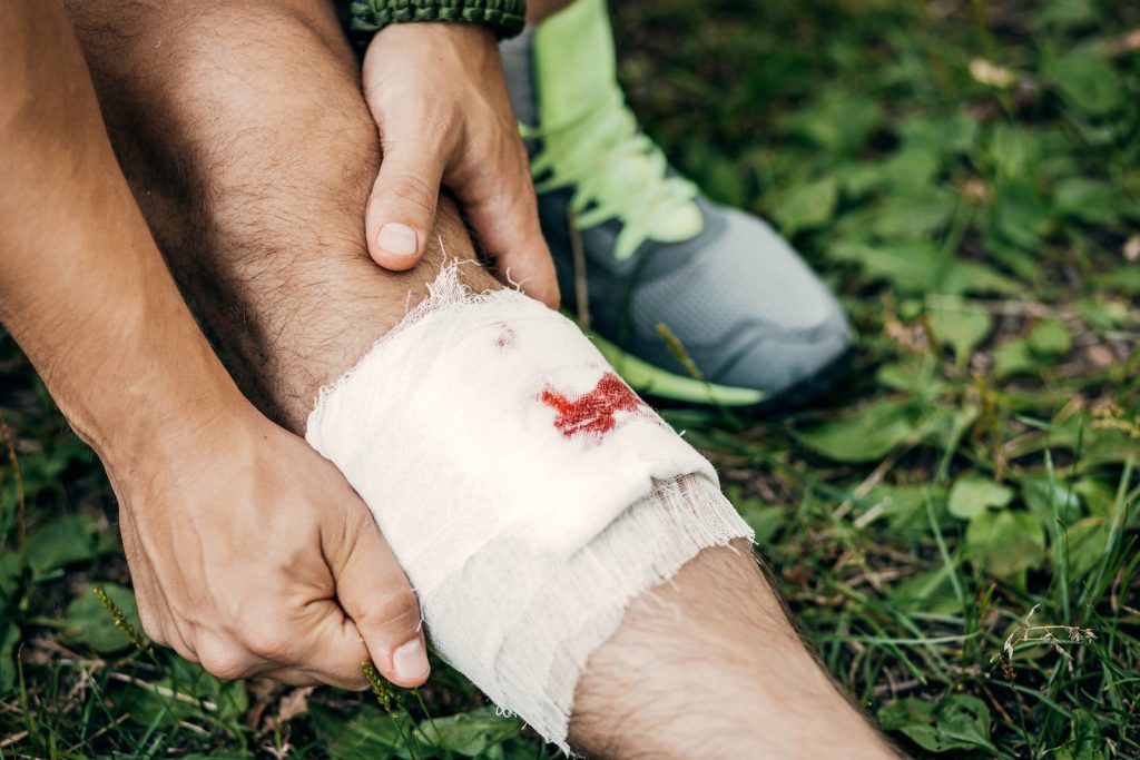 dressing a wound while hiking