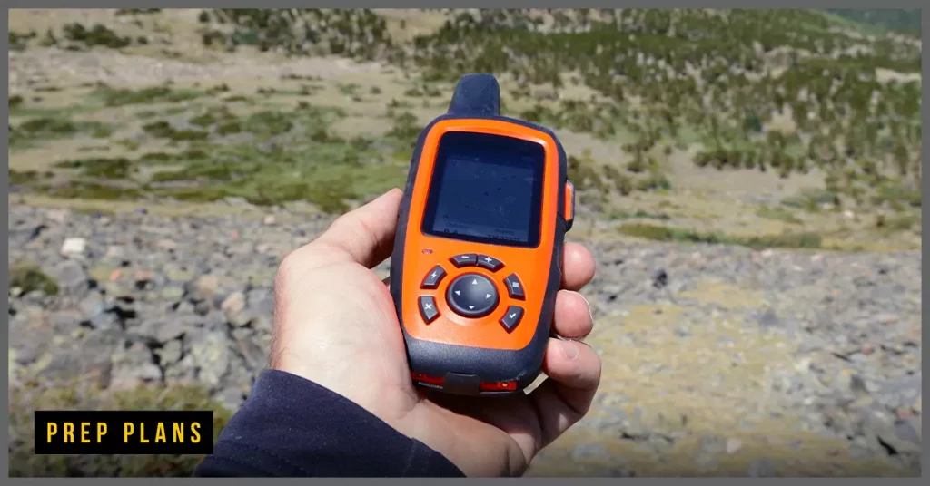 orange GPS phone being used as an off grid option