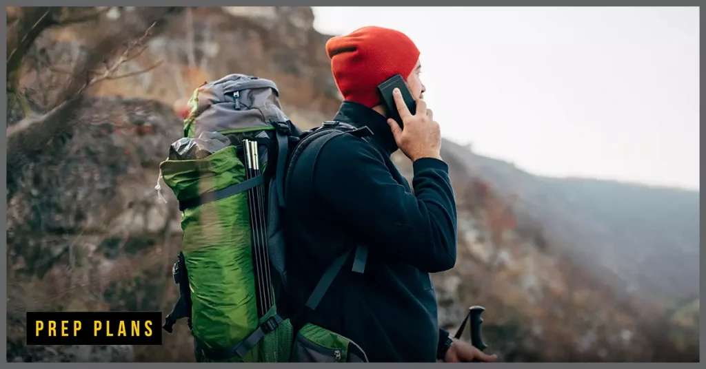 mesh network phone being used by a man in a red hat